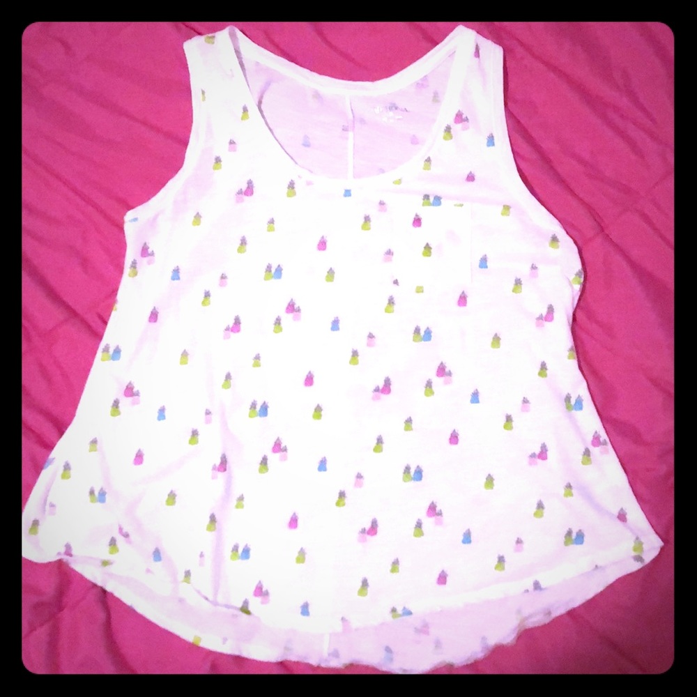 White high low tank with bright pineapples
